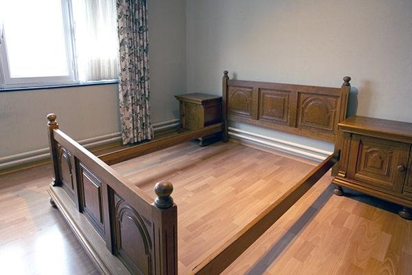 our bed frame removal process involves dismantling and disposing of the bed frame